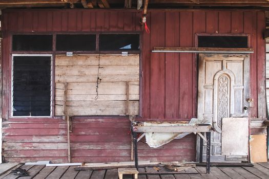 Old wooden house against grunge background.,thailand