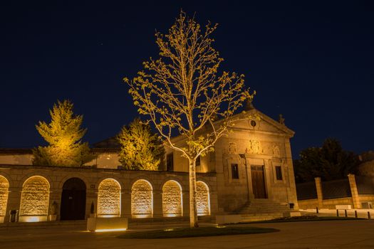 Night view of square in the front of Santa Teresa Convent in Avila, Spain