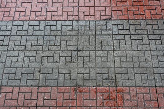 Pattern of the wet footpath floor.