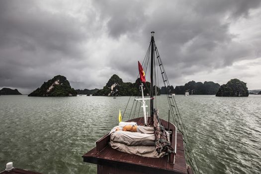 View throughout the islands of Ha Long Bay on a stormy summer's day in Ha Long Bay, Vietnam