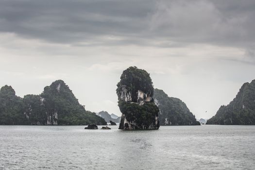 View throughout the islands of Ha Long Bay on a stormy summer's day in Ha Long Bay, Vietnam