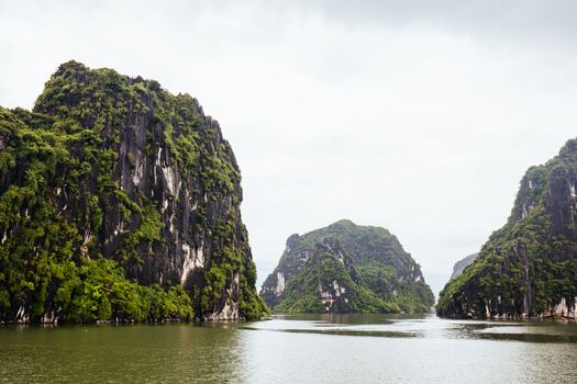 View throughout the islands of Ha Long Bay on a stormy summer's day in Ha Long Bay, Vietnam