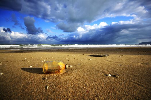 Old glass bottle on the beach