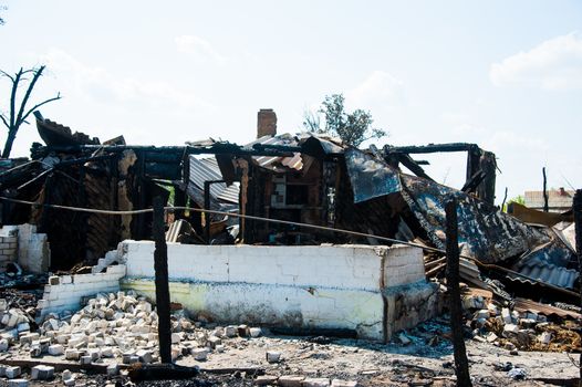 Ruins of house after big disaster - fire