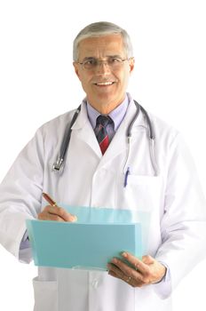 Middle aged doctor writing in a patients chart over light gray background vertical composition torso only