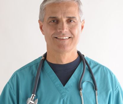 Close up of a Smiling Middle Aged  Doctor in Scrubs and Stethoscope square format