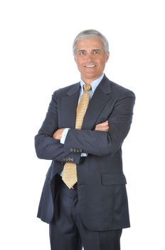 Smiling Businessman in dark suit standing with his arms folded isolated on white