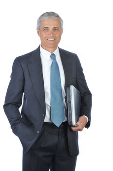 Businessman carrying Laptop Under His arm with hand in pocket isolated on white