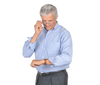 Businessman Touching eyeglasses and looking at his wrist watch isolated on white