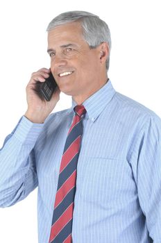 Smiling Middle aged businessman talking on his cell phone isolated over white