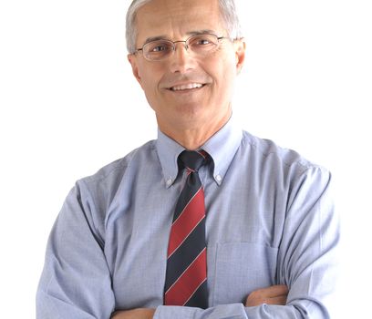 Portrait of a middle aged businessman standing with his arms crossed. Square format isolated on white background.