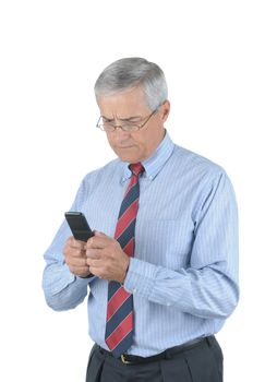 Middle Aged Businessman trying to send a text message from his Cell Phone isolated over white