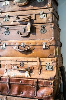 Malaga, Spain - August 19, 2018. old classic travel suitcases at Automobile and Fashion Museum Malaga, Spain.