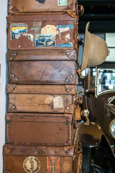 Malaga, Spain - August 19, 2018. old classic travel suitcases at Automobile and Fashion Museum Malaga, Spain.