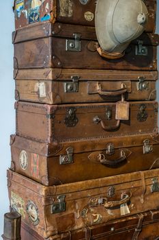 Malaga, Spain - August 19, 2018. old classic travel suitcases at Automobile and Fashion Museum Malaga, Spain.