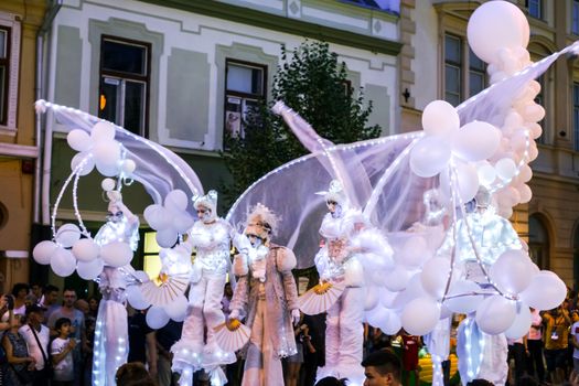 Sibiu City, Romania - 20 June 2019. Mademoiselle Paillette perform White World show in night at the Sibiu International Theatre Festival from Sibiu, Romania.