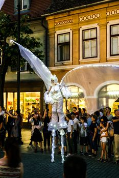 Sibiu City, Romania - 20 June 2019. Mademoiselle Paillette perform White World show in night at the Sibiu International Theatre Festival from Sibiu, Romania.