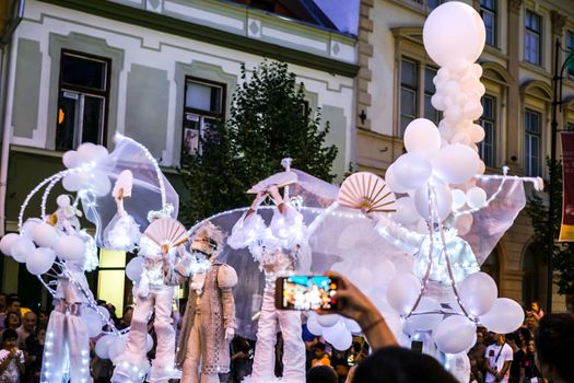 Sibiu City, Romania - 20 June 2019. Mademoiselle Paillette perform White World show in night at the Sibiu International Theatre Festival from Sibiu, Romania.