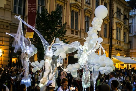 Sibiu City, Romania - 20 June 2019. Mademoiselle Paillette perform White World show in night at the Sibiu International Theatre Festival from Sibiu, Romania.