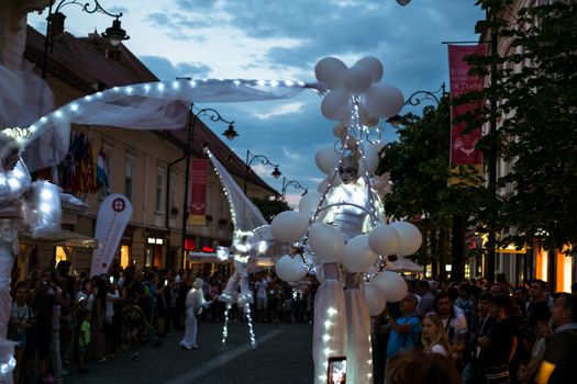 Sibiu City, Romania - 20 June 2019. Mademoiselle Paillette perform White World show in night at the Sibiu International Theatre Festival from Sibiu, Romania.