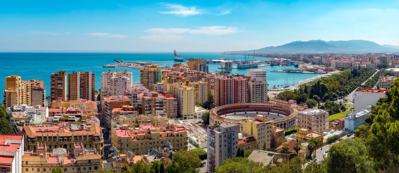 Malaga, Spain. May 26, 2108. Panoramic view of the Malaga city, harbor and bullfighting arena, Costa del Sol, Malaga Province, Andalucia, Spain, Western Europe