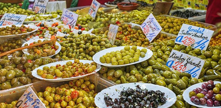 Malaga, Spain - May 05, 2018. Olive stand at the market of Ataranzanas Central Market, Malaga, Spain