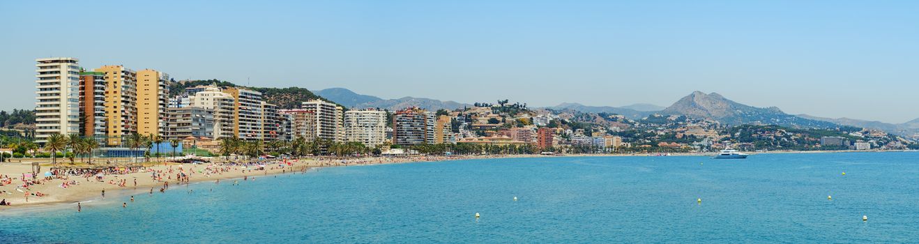 Malaga, Spain - June 26, 2018. Panoramic view over the Malagueta beach on a clear day, Malaga city, Costa del Sol, Malaga Province, Andalucia, Spain, Western Europe