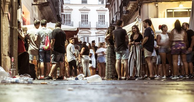 Malaga, Spain - August 12, 2018. People having fun in the historic center at the Feria de Malaga, an annual event that takes place in mid-August and is one of the largest fiestas in the Spain