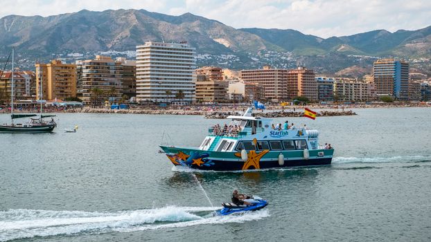 Fuengirola, Spain - June 31, 2018. pleasure boats at sea in the bay, Fuengirola city, Costa del sol, Spain