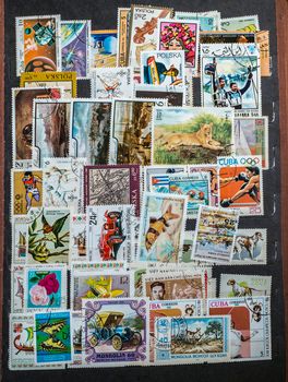 Giurgiu city, Romania - October 10, 2017. Old postage stamps arranged in the album