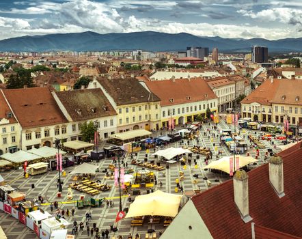 Sibiu, Romania - June 06, 2019, Street Food Festival Sibiu 2019 in Grand Square, Sibiu, Romania, aerial view