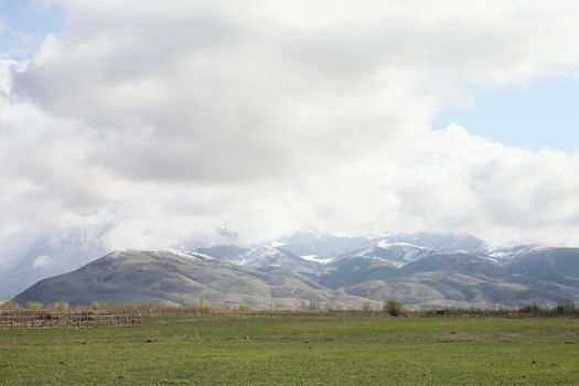 Beautiful mountain landscape. Wildlife Kyrgyzstan. Clouds in the sky. Kyrgyzstan. High quality photo