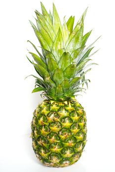 A whole pineapple against a plain white background