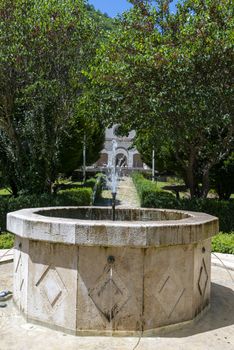 rocca porena,italy july 05 2020:fountain in the garden of the sanctuary of rocca porena