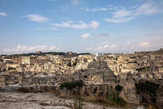 Panoramic view of Sassi di Matera a historic district in the city of Matera, well-known for their ancient cave dwellings from the Belvedere di Murgia Timone,  Basilicata, Italy 