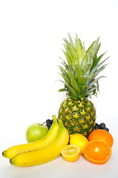 A selection of tropical fruit against a plain white background