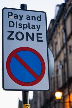 A pay and display zone road sign in England
