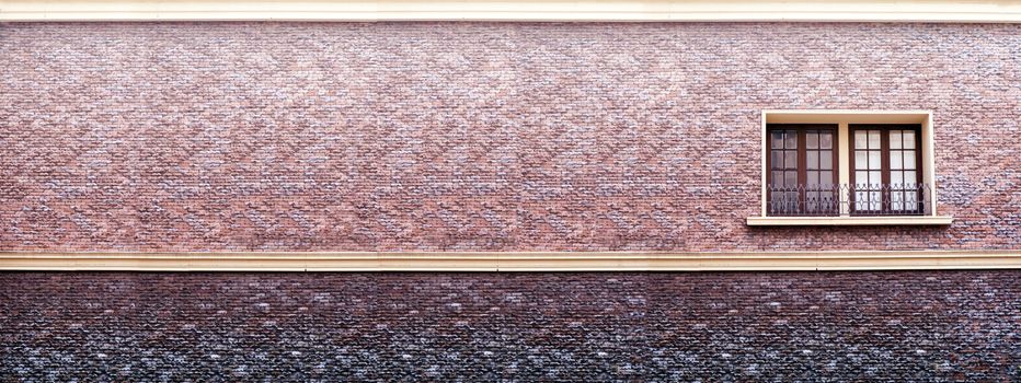 panorama of sand stone brick wall gray red color and window