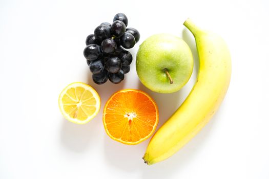 A selection of tropical fruit against a plain white background