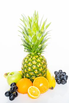 A selection of tropical fruit against a plain white background