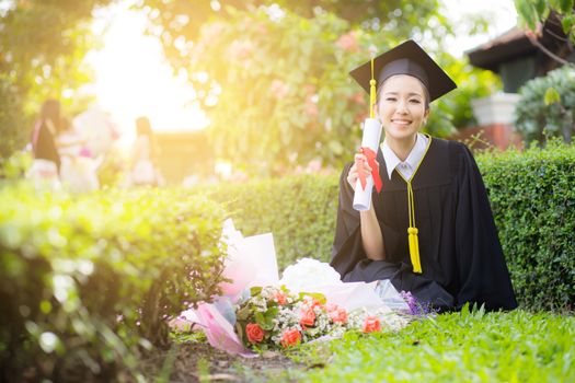 Happy graduated student girl - congratulations of education success.