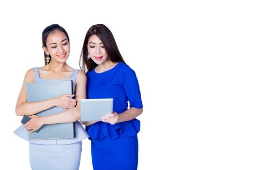 Isolated businesswoman two people looking at tablet pc on white background.