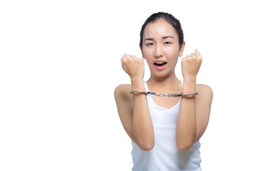 Beautiful Asian woman with pure face and her hand in shackle,She can not make up with a copy space