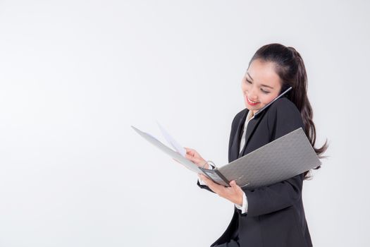 smiling businesswoman are talking by smartphone and holding file looking document on white background.