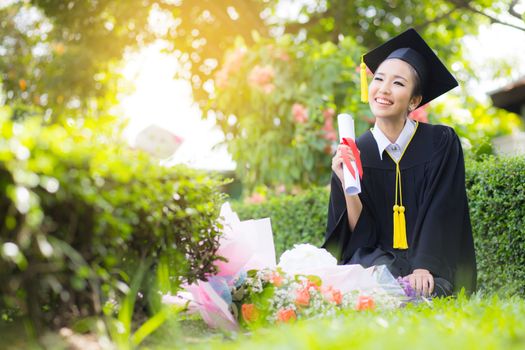 Happy graduated student girl - congratulations of education success.