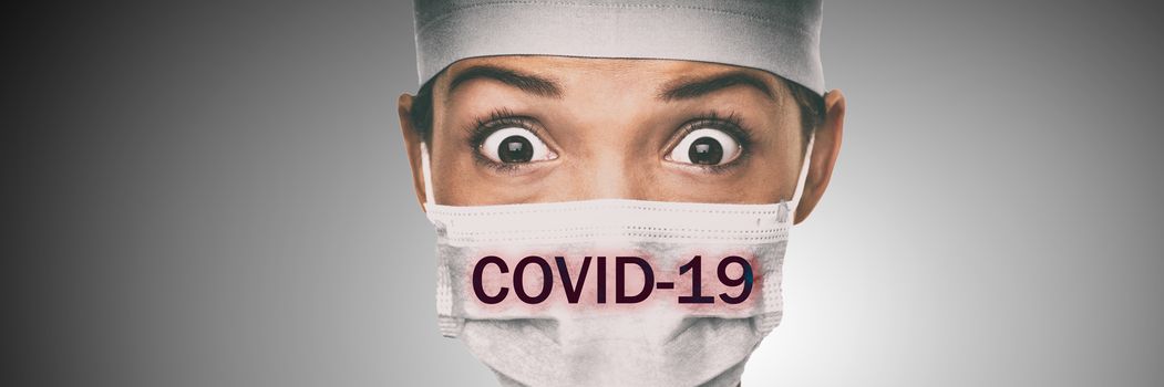 Covid-19 coronavirus text written over doctor surgical face mask Asian woman hospital worked scared shocked by Corona virus pandemic worried. Title on background.