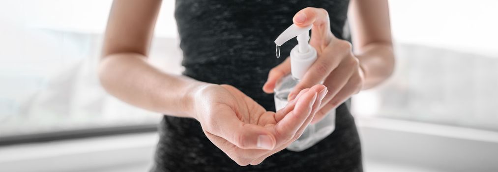 COVID-19 Hand sanitizer rubbing hands woman applying sanitizing gel liquid clean personal hygiene coronavirus pervention at home. Sanitiser bottle banner header.