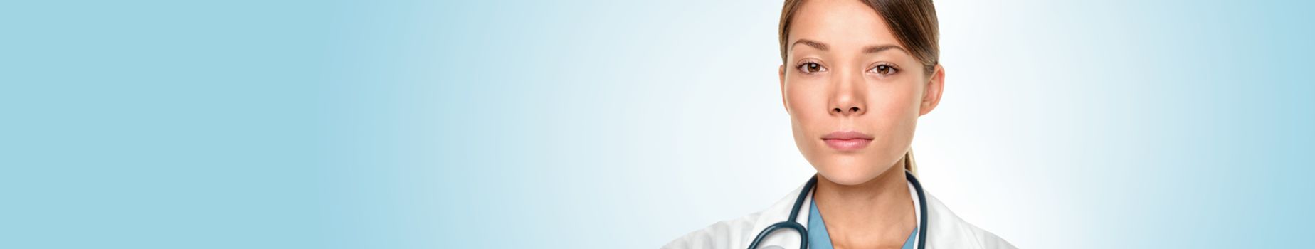 Medical doctor Asian woman portrait with serious expression banner panoramic blue background.