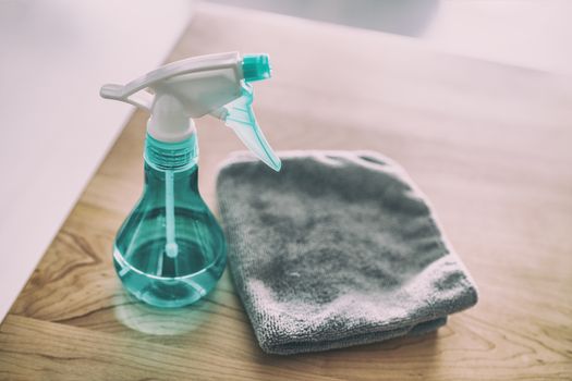 Surface cleaning home kitchen All purpose cleaner disinfectant spray bottle with towel to clean high touch surfaces from COVID-19 virus contagion.