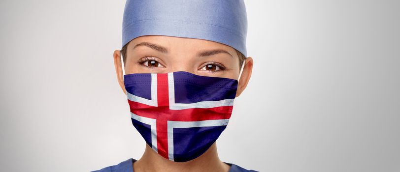 Icelandic flag Iceland COVID-19 panoramic banner Corona virus outbreak pandemic doctor woman wearing PPE protective face mask for coronavirus prevention. Asian nurse happy. Health care worker helping.